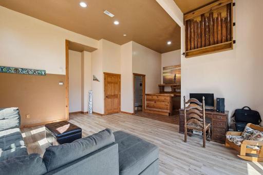 Family room with the bar and 3/4 Bath and sauna