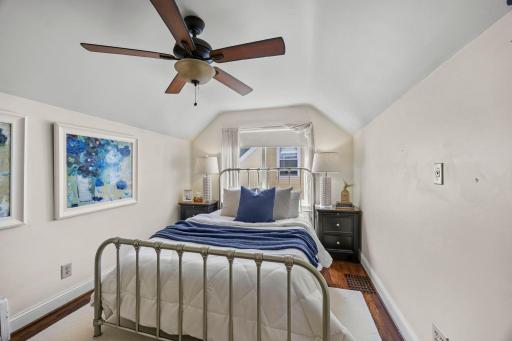 Private third bedroom with side views on the upper level.