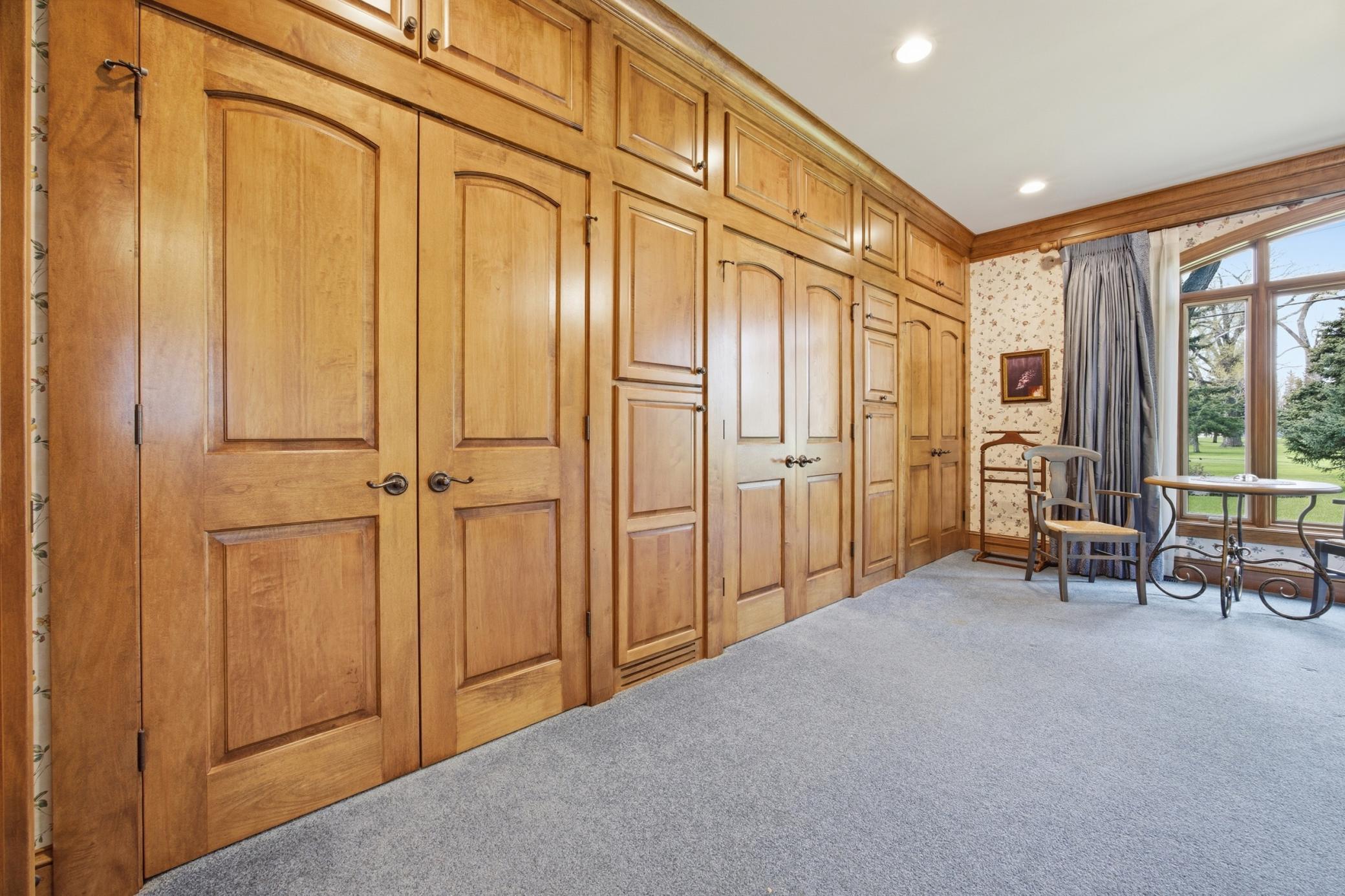 Primary Bedroom Wall of Closet Space