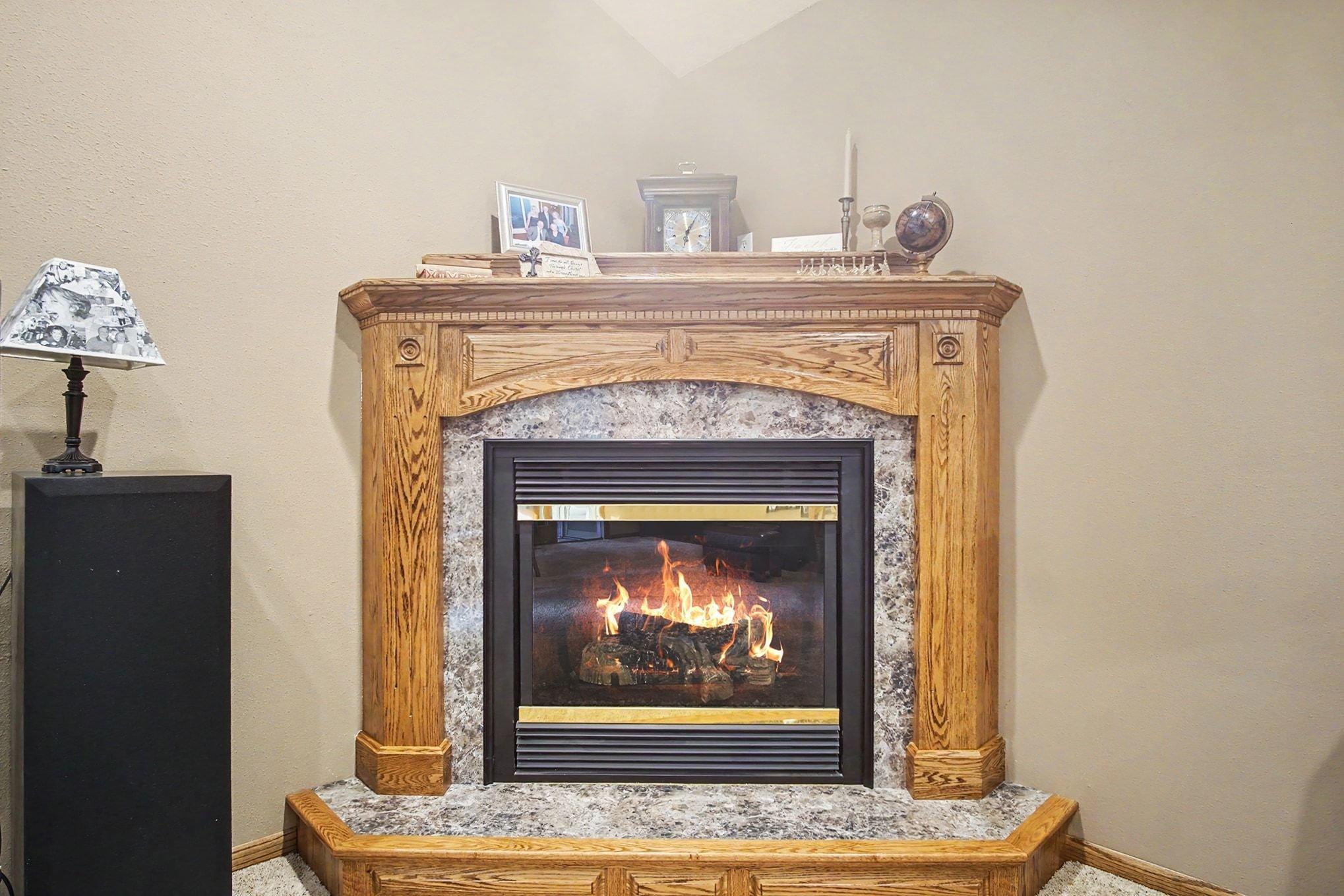 Custom Country Cupboards gas fireplace