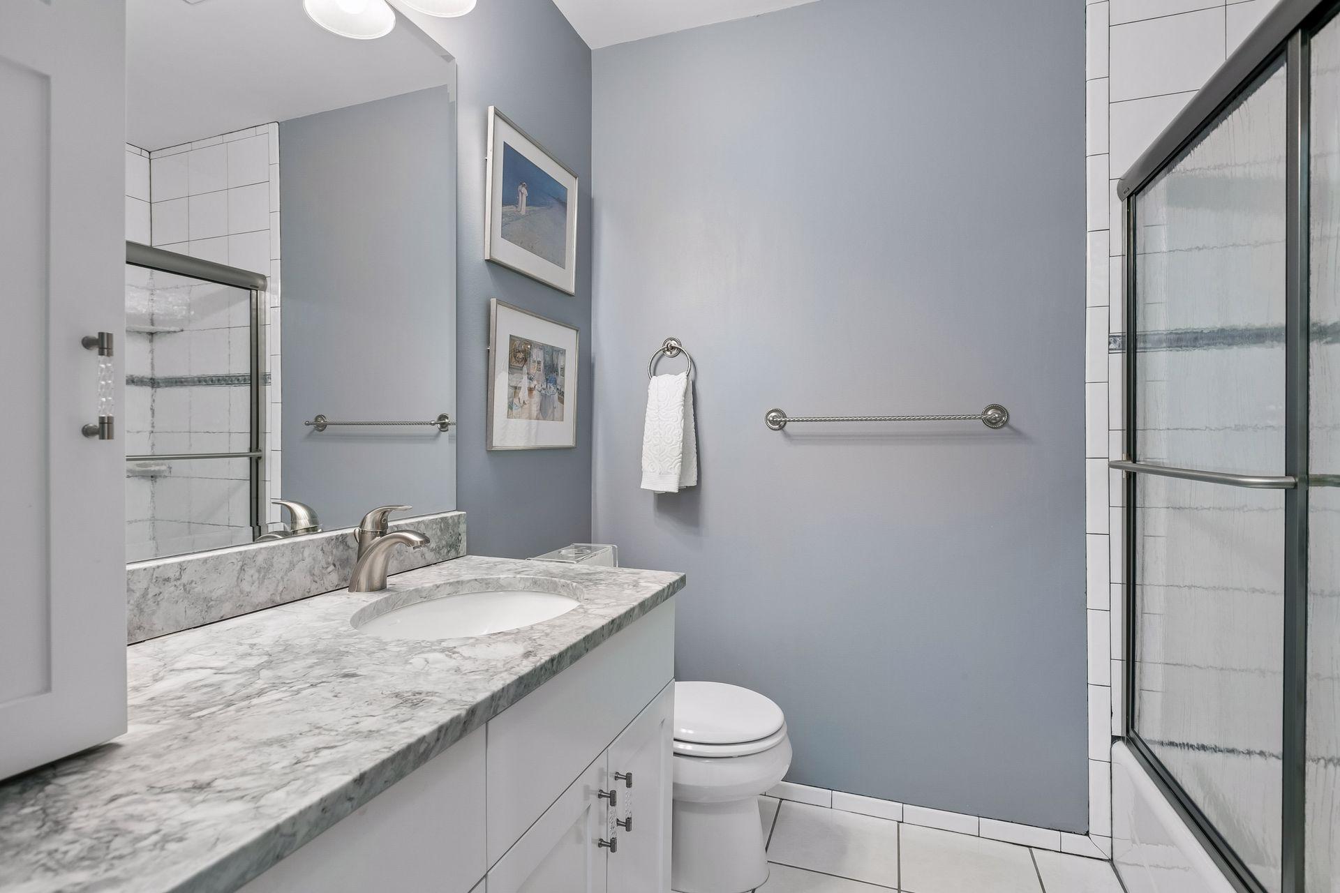 Full Bath across the hall from BR # 2 & 3 off the upper Level Hallway.