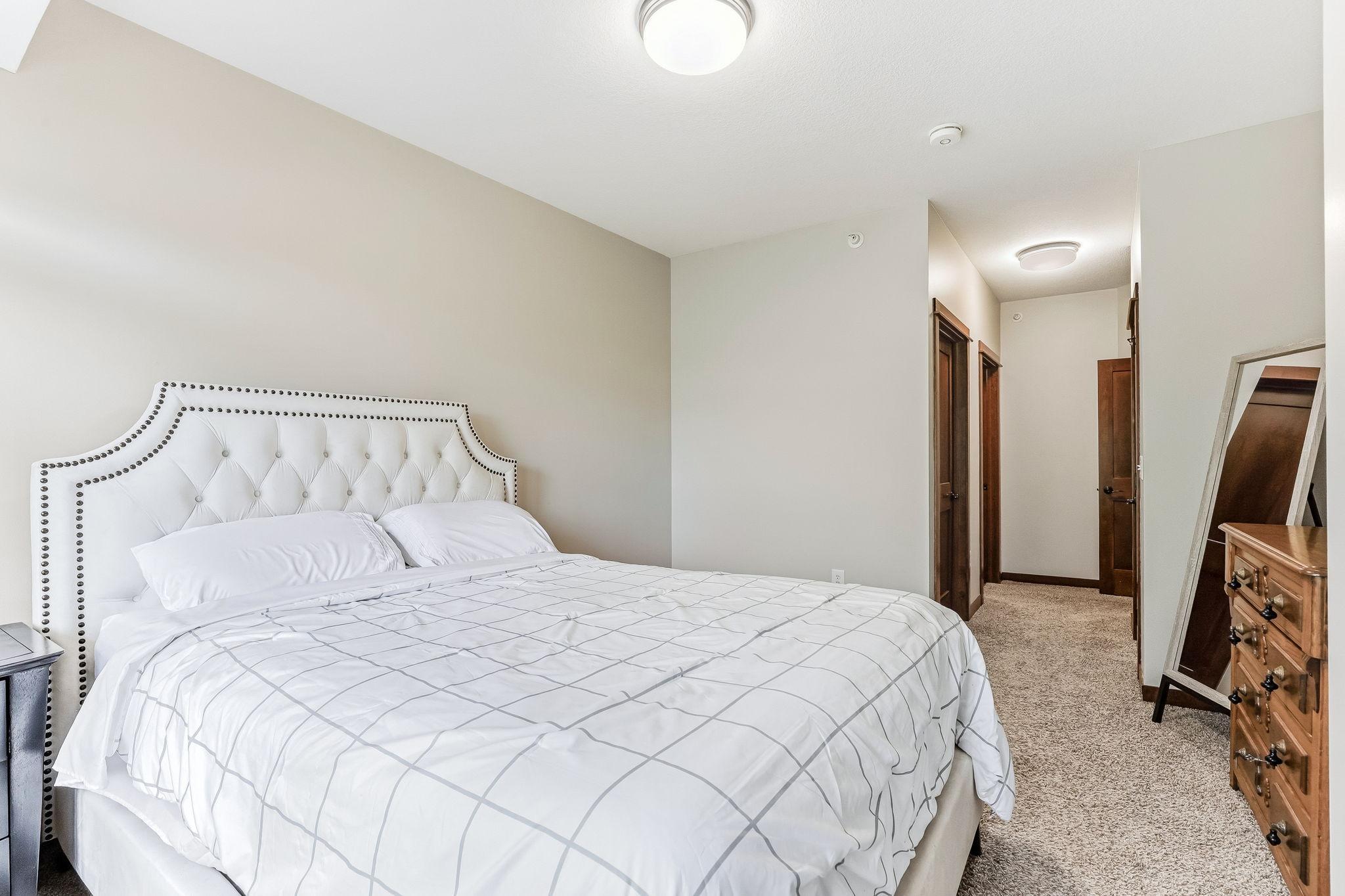 Primary suite with walk in closet and 3/4 bath.
