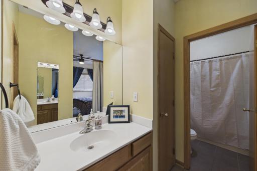 Private primary bath has a nice vanity and bright lights