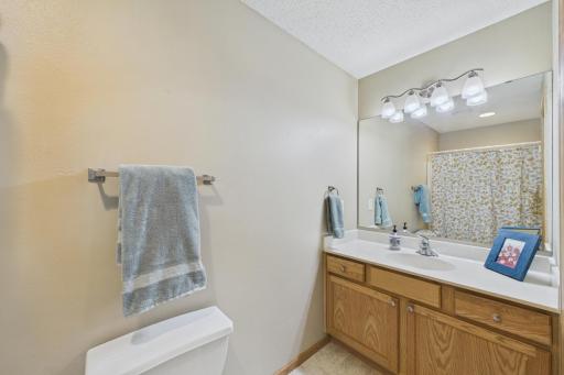 Upper level full bath is bright and spacious.