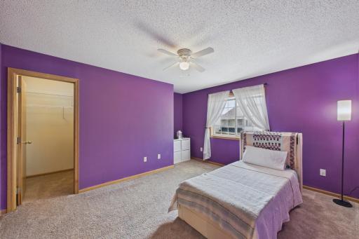 Huge 3rd bedroom includes a large walk in closet with shelving, a little nook and big window.