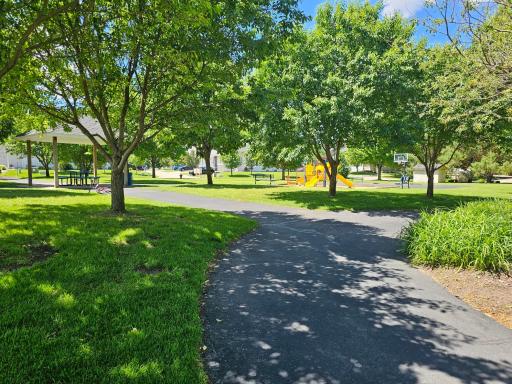 The park, complete with a playground is conveniently located at the end of the block, just around the corner.