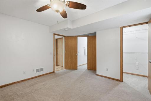 LL Bedroom with walk in closet and bathroom access.