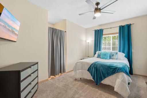 Main Level Spacious Bedroom with a large walk-In closet and private bath.