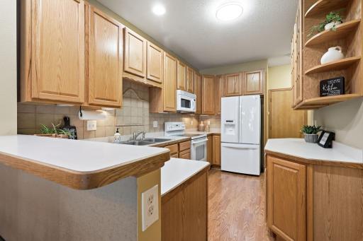 High-top breakfast bar overlooks the kitchen