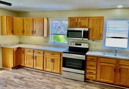 New flooring and paint, recessed lighting and ceiling fan