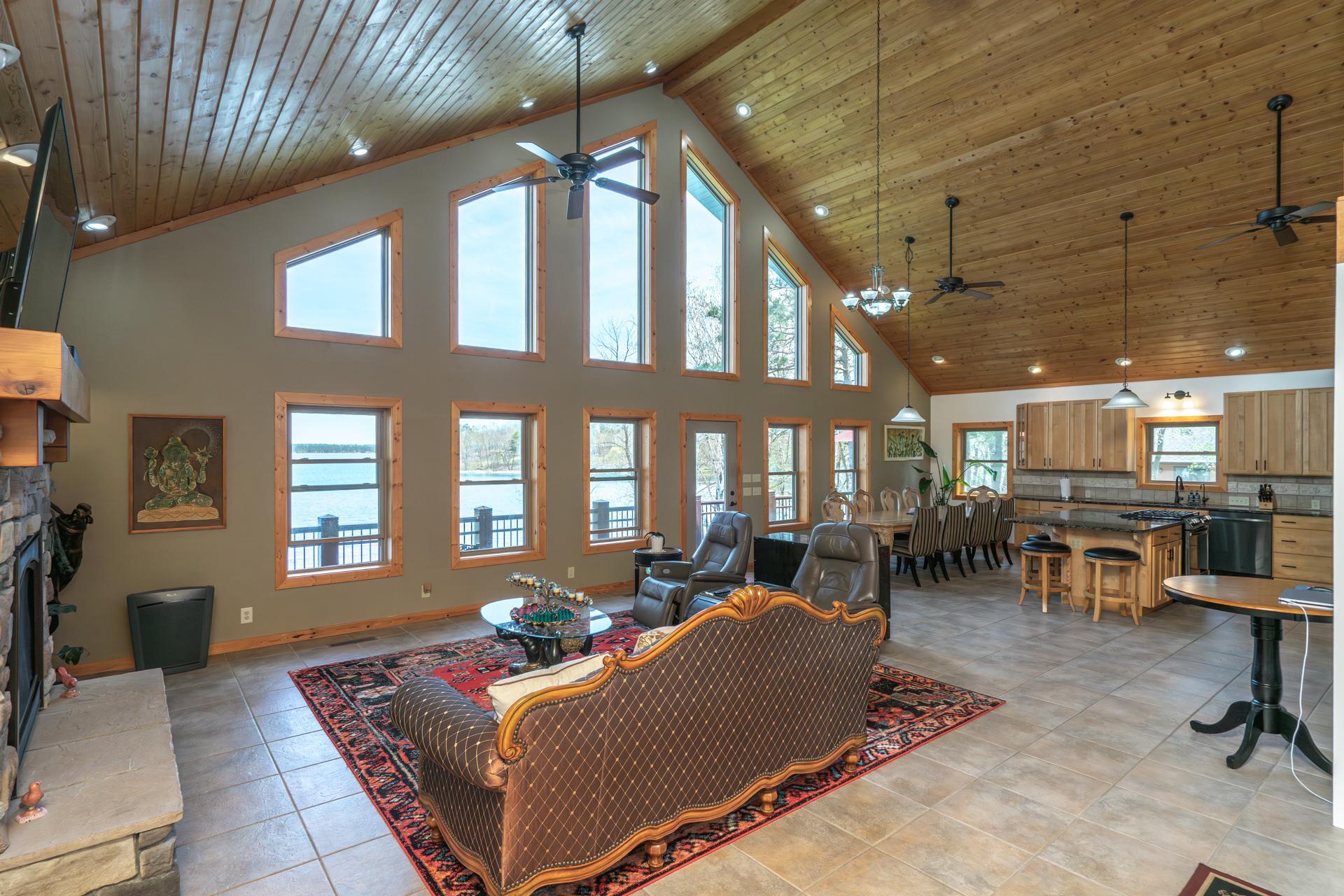 Wall of lakeside windows for incredible views and natural lighting!
