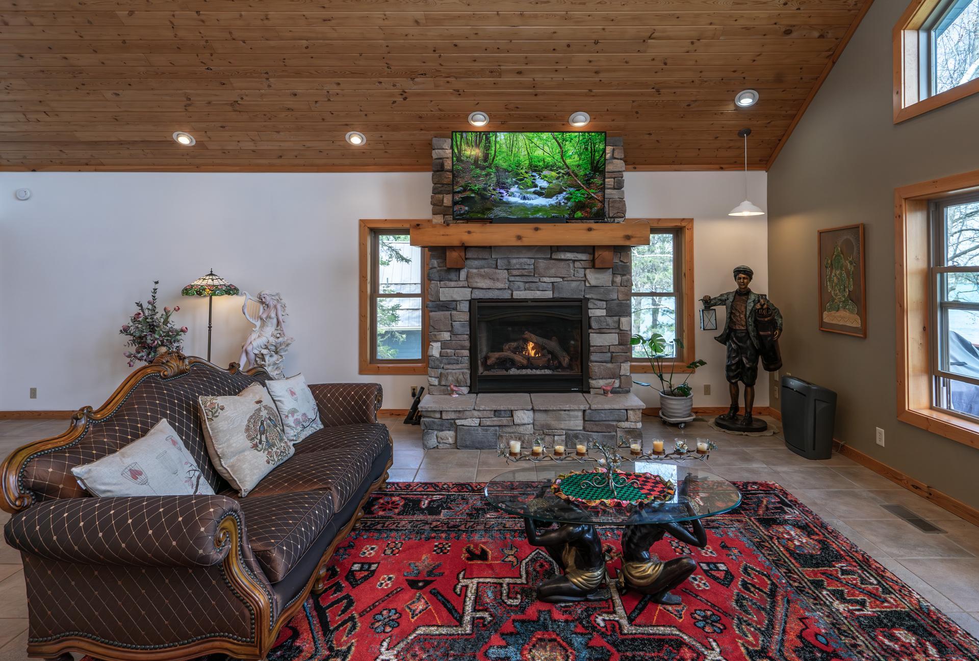 Nice main level living room space with gas fireplace