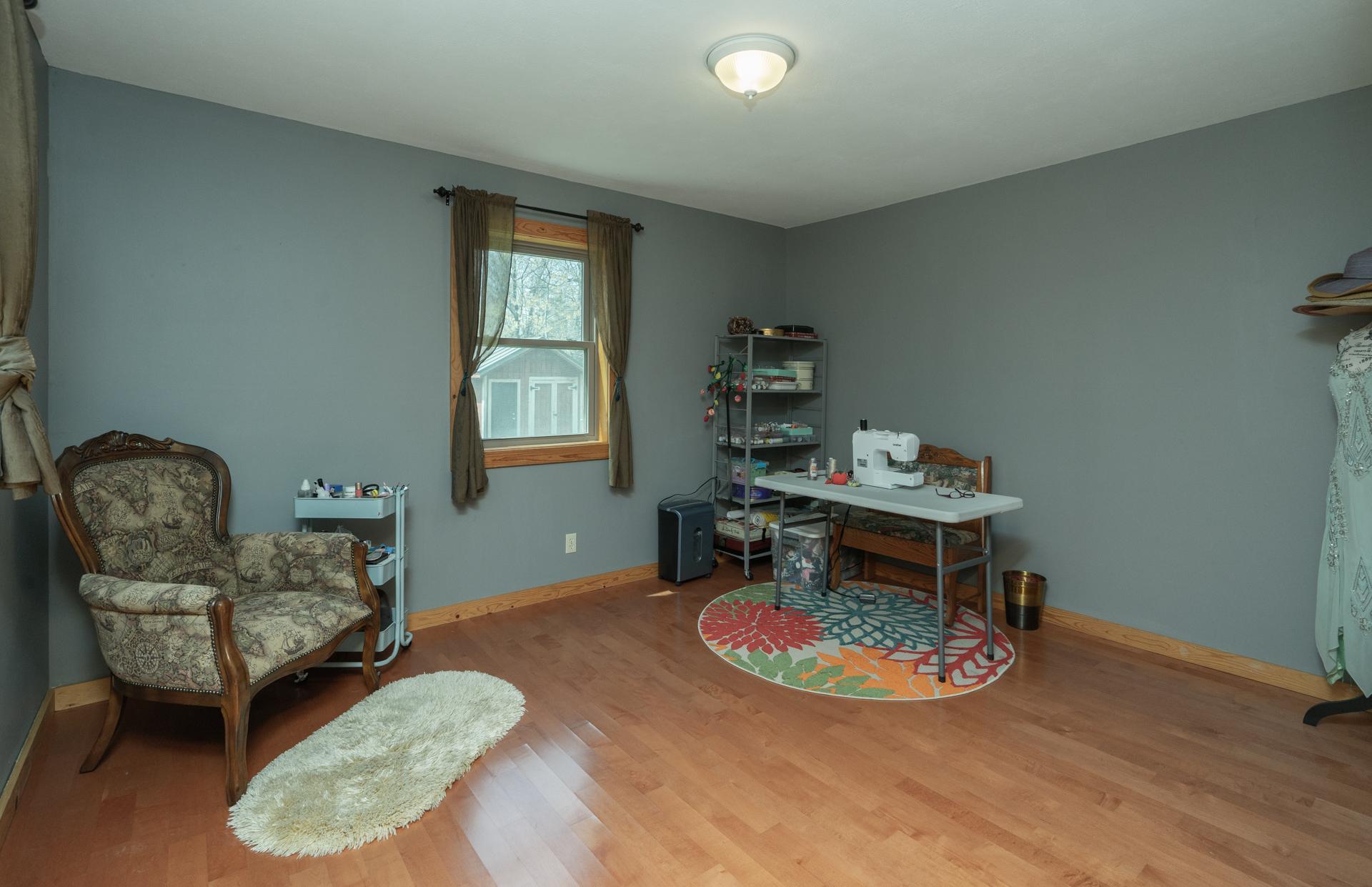 2nd main level bedroom could also be used as an office/hobby space