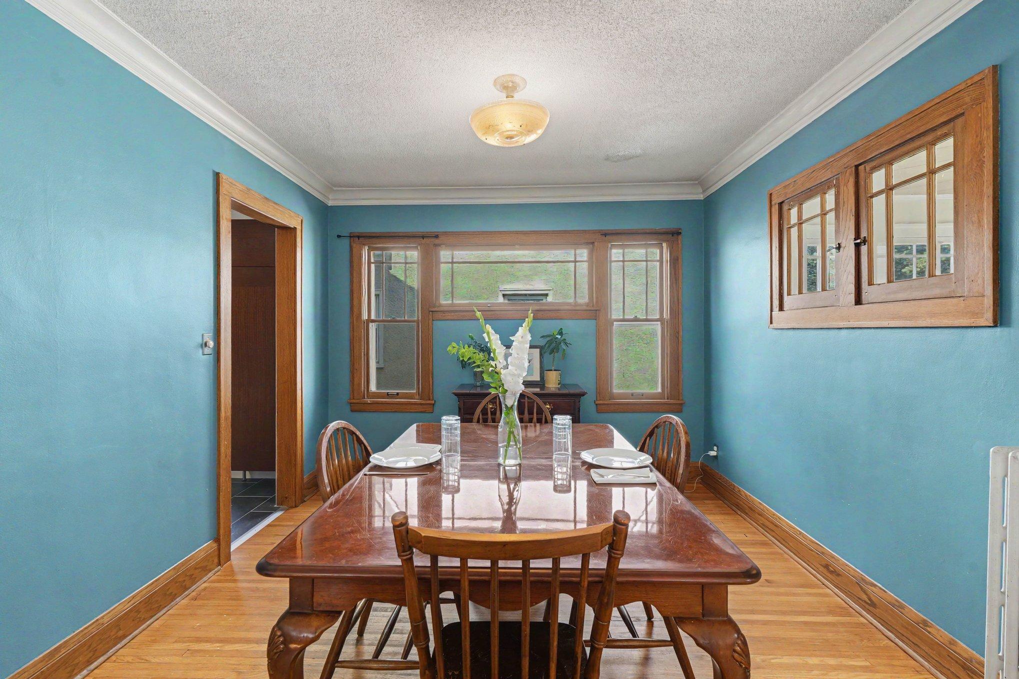 which transitions smoothly into this formal dining area