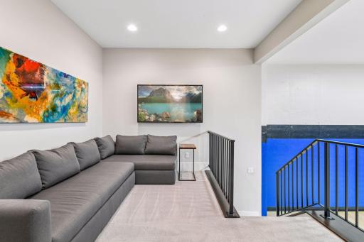 Landing adjacent to the sports court perfect for a bar area or lounge