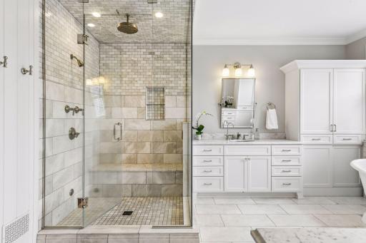 Master Bath features large walk-in steam shower, soaking tub, dual vanities and walk in closet