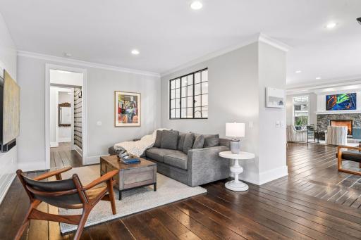Family Room off of the Kitchen creates additional spaces to relax or entertain