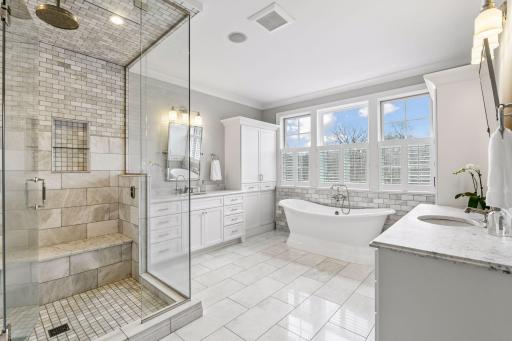 Master Bath features large walk-in steam shower, soaking tub, dual vanities and walk in closet