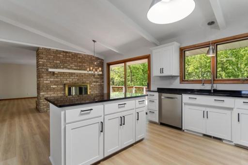 Eat in kitchen next to the cozy wood burning fireplace