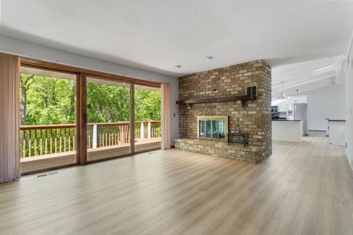Double sided wood fireplace and this flex space would make a great reading nook, seller used to keep their Piano here