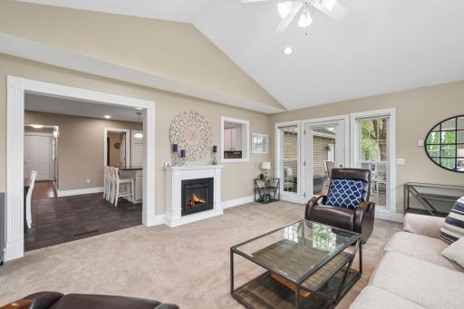The sunroom connects seamlessly to the kitchen through a convenient passthrough window, creating an easy flow for serving and everyday use. It also opens to a new maintenance free deck making indoor-outdoor grilling and entertaining simple.