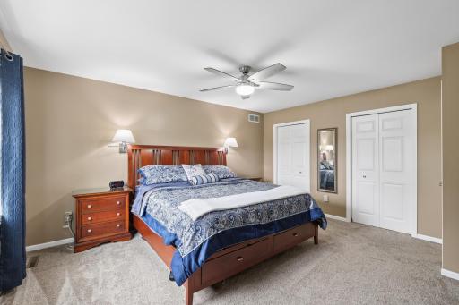 Primary suite offers 2 closets and private full bathroom.