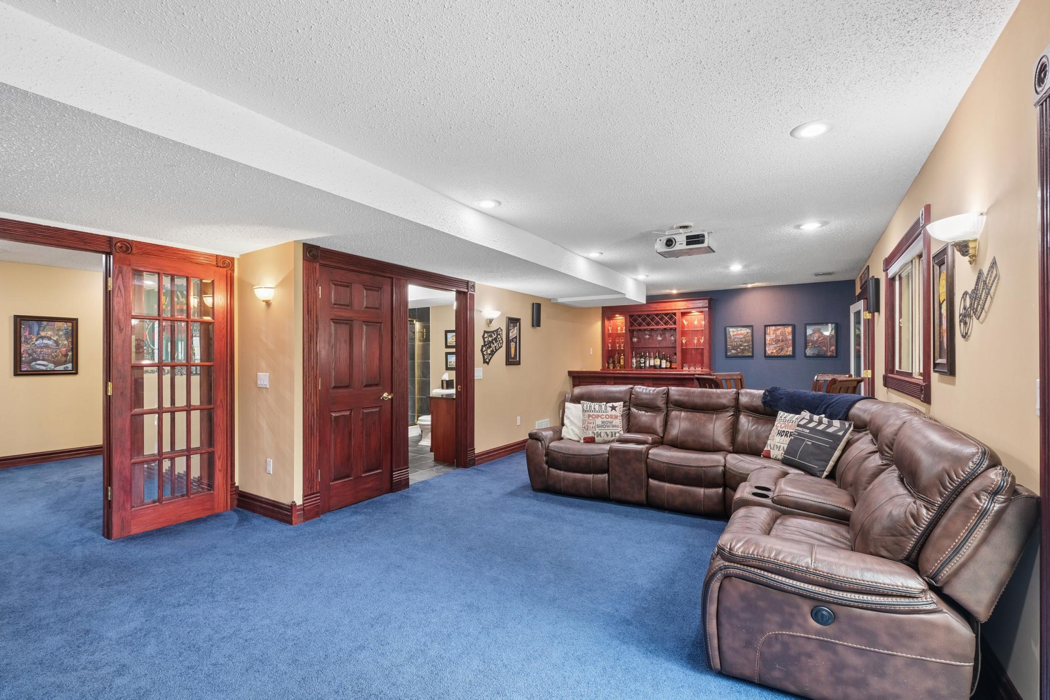 Phenomenal walkout lower level designed for entertaining, relaxing, and everyday living with expansive spaces to fit all your needs.