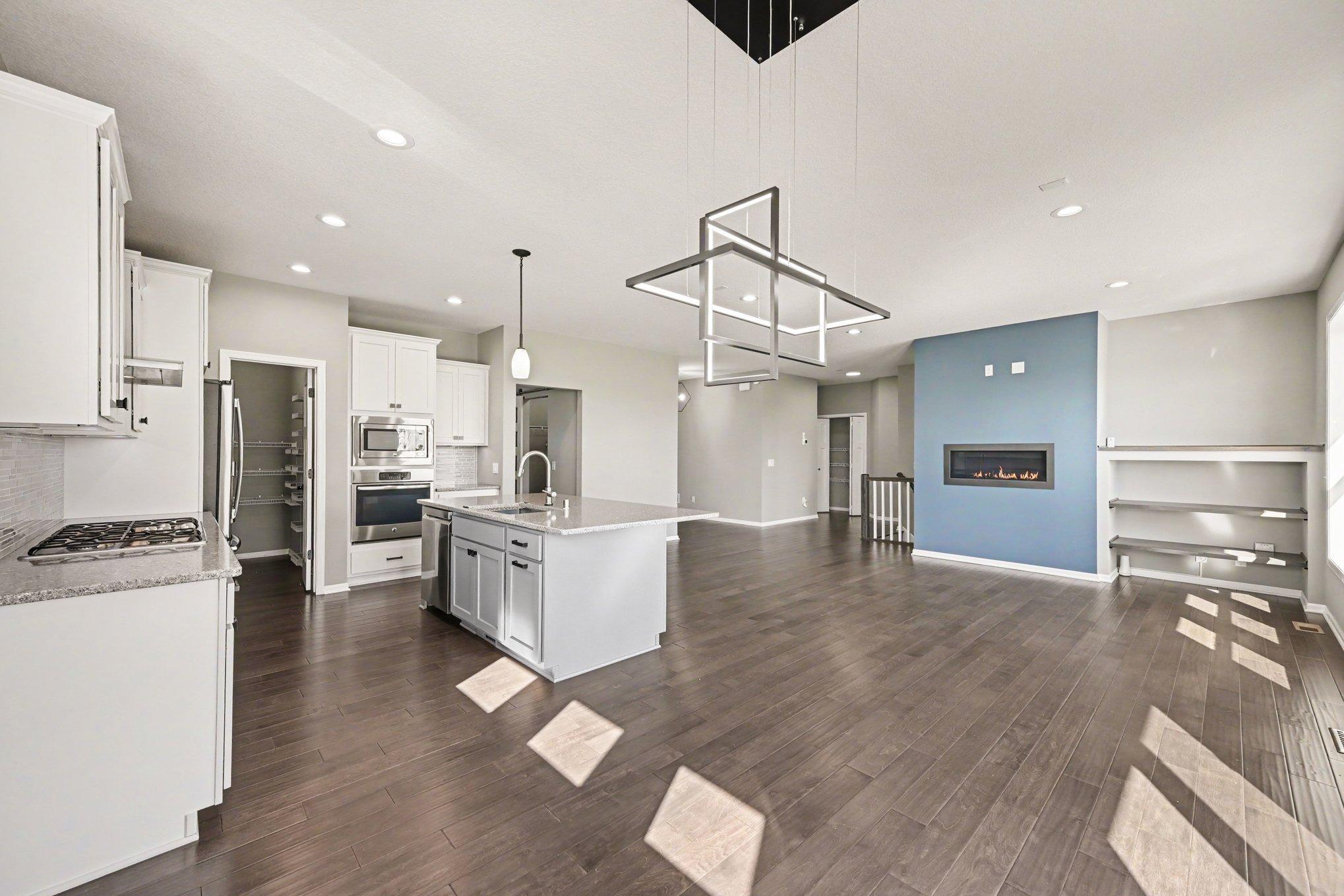 Open floorplan kitchen, dining, and main living area
