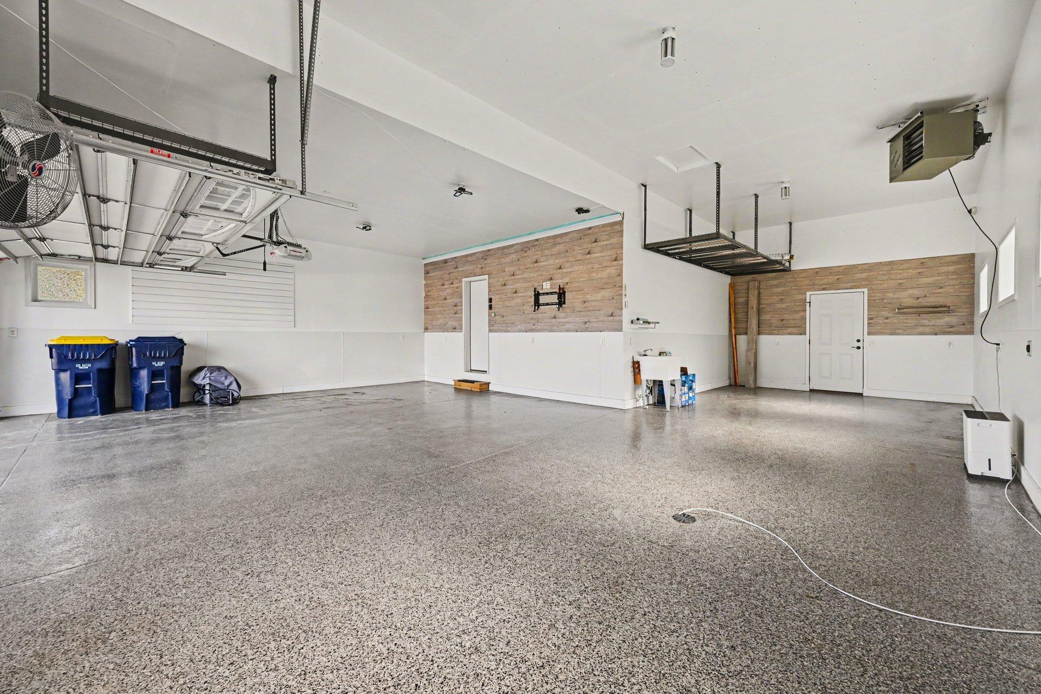 Oversized heated garage, 3-car + tandem, extra tall ceilings