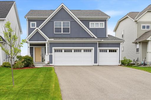 Better than new construction! Stunning 2021-built two-story home featuring modern curb appeal, a spacious 3-car garage, professionally maintained landscaping, and stylish designer finishes throughout.