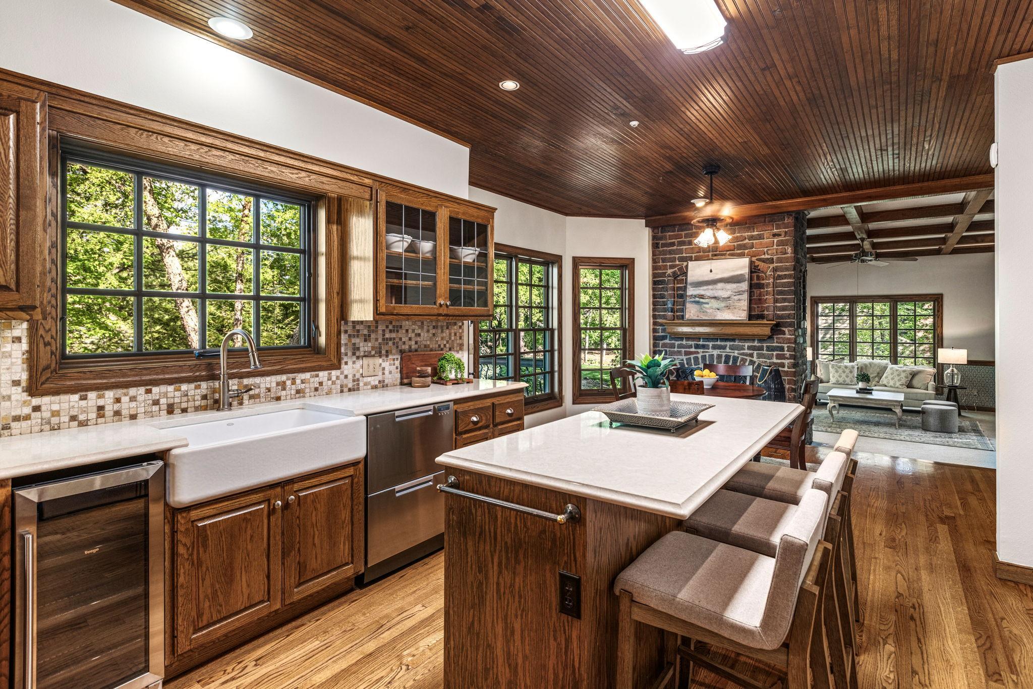 The open-concept layout flows seamlessly into the dining and living spaces.