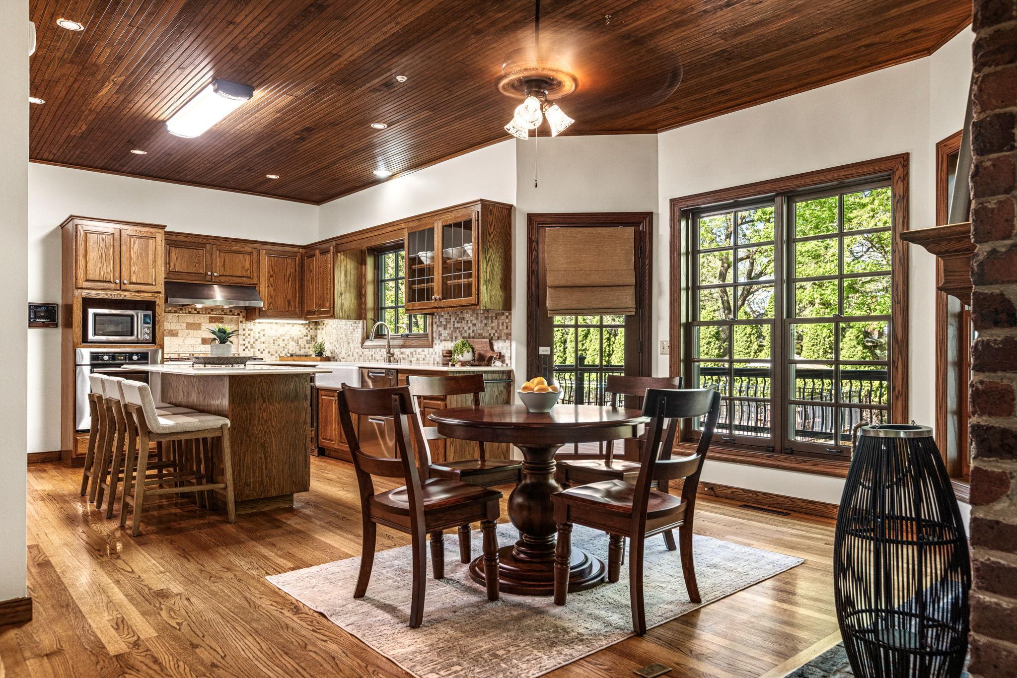 Informal dining with walkout to the deck and backyard.