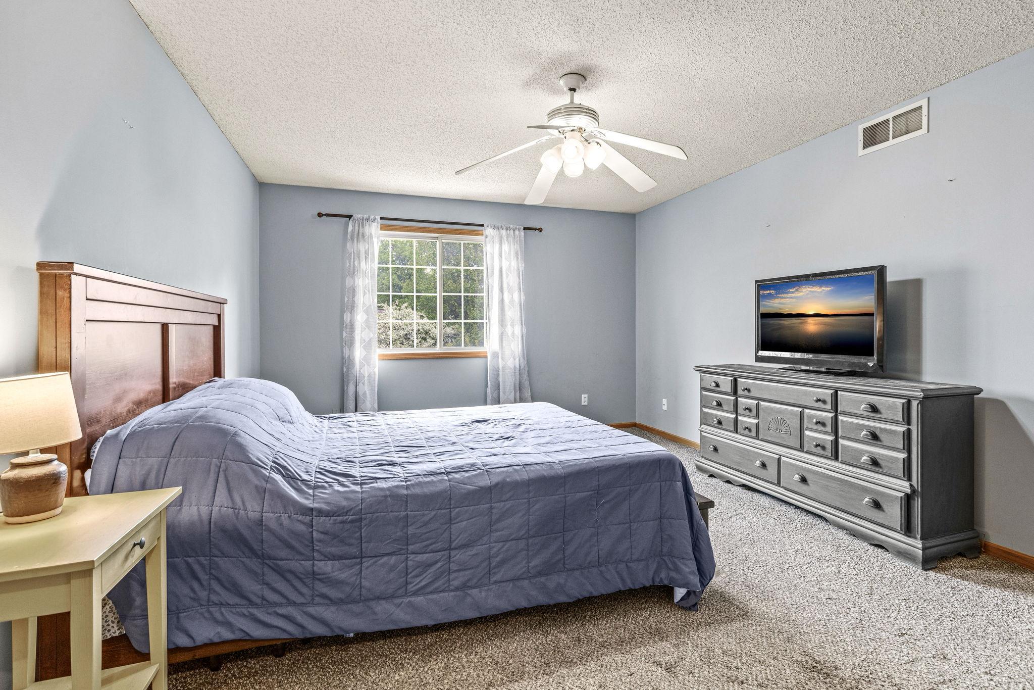 primary bedroom with walk in closet