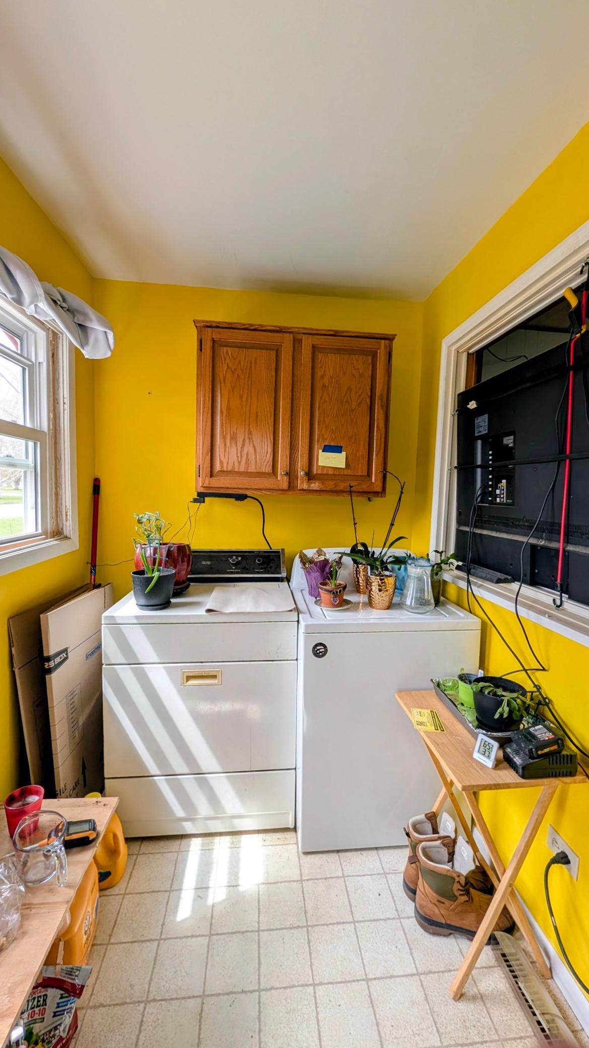 Sun drenched Main floor porch/laundry