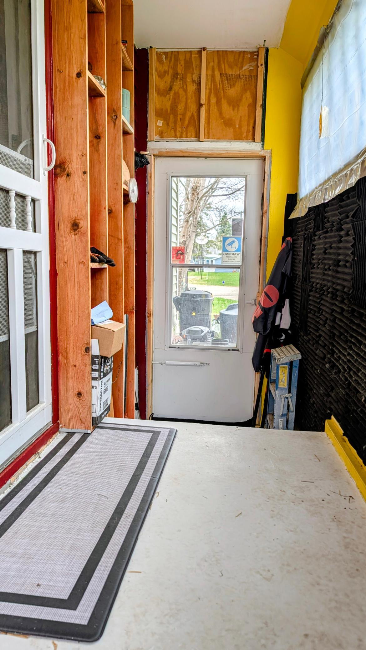 Porch on the side acts as a nice mud room.