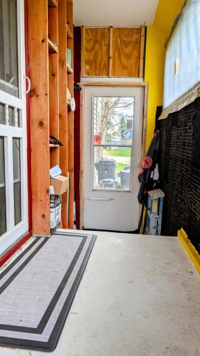 Porch on the side acts as a nice mud room.