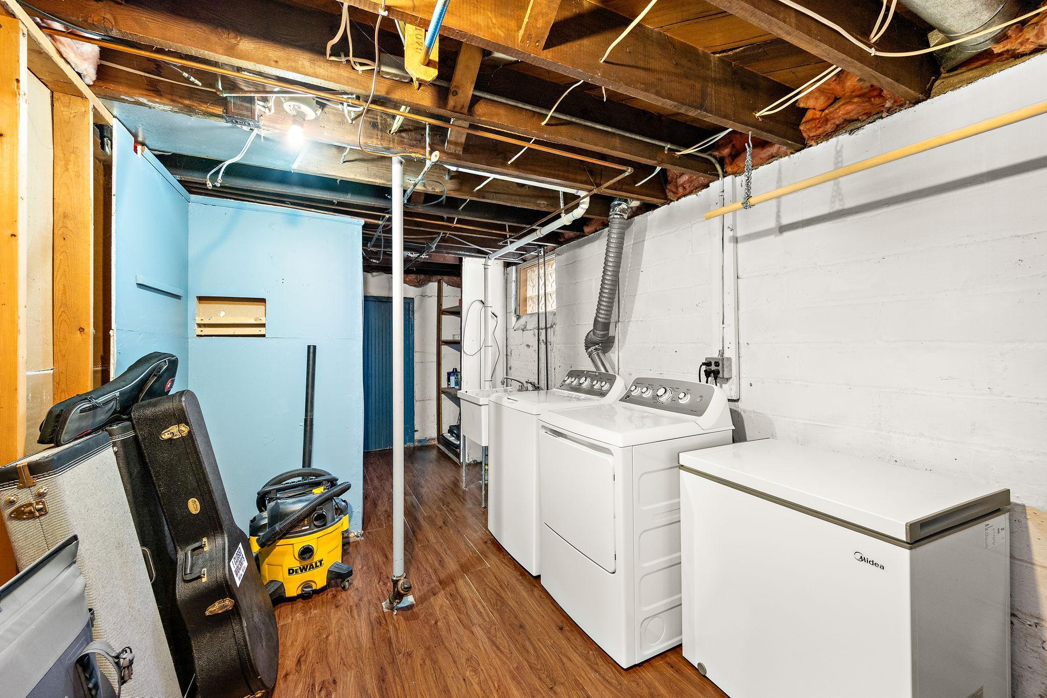 Laundry Area with Laminate Floor