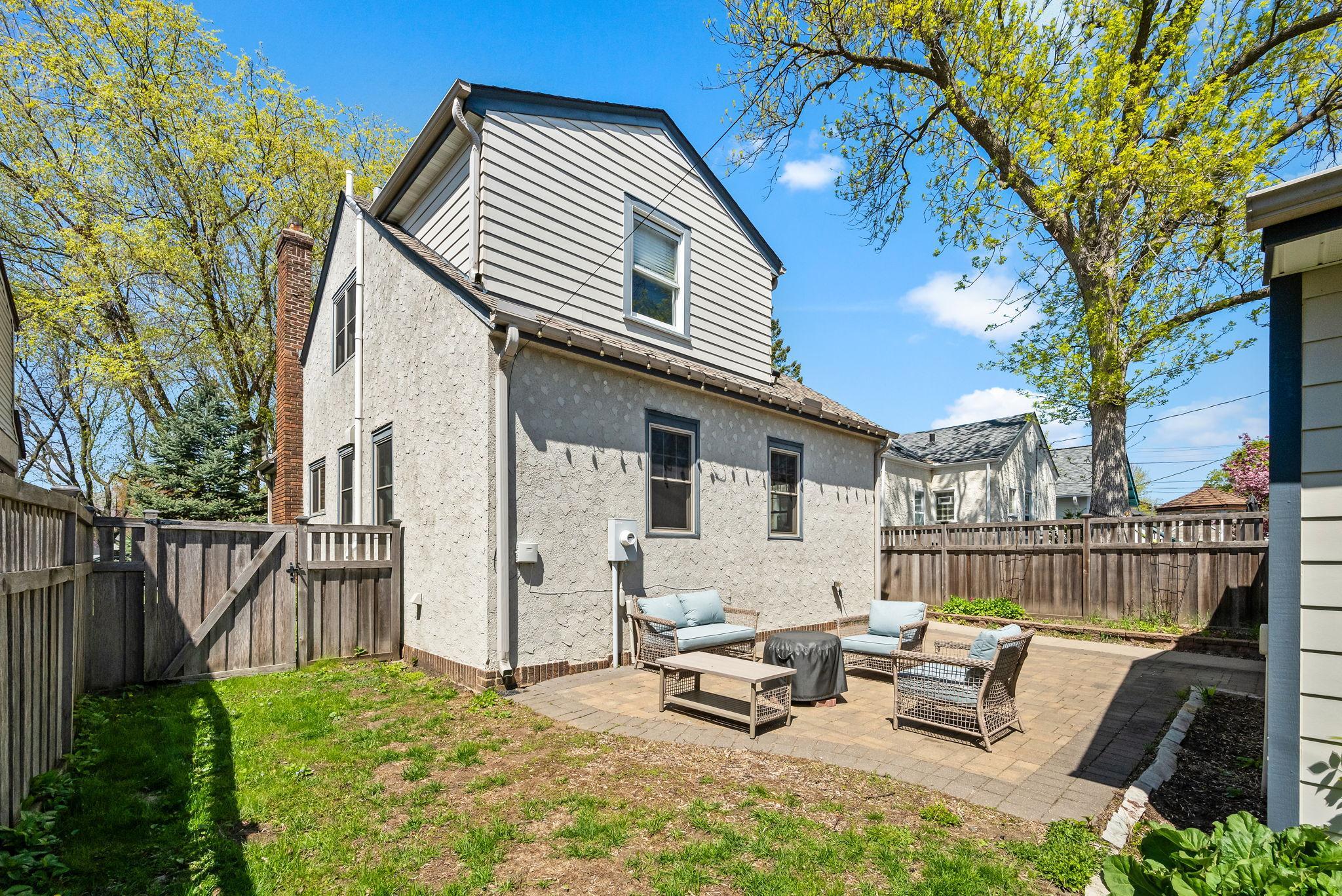 Rear View Fenced Yard & Patio