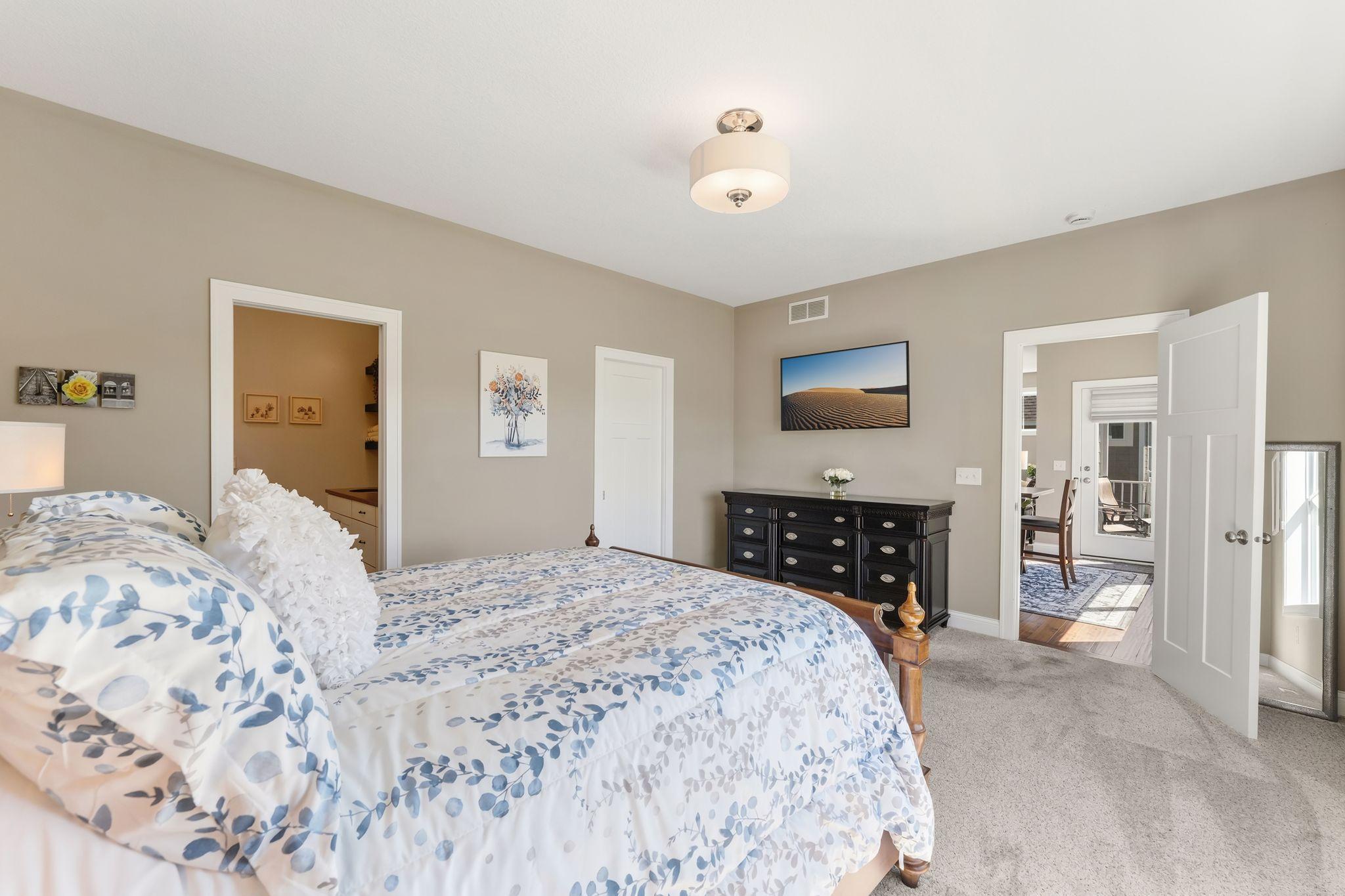 Walk in closet in primary bedroom