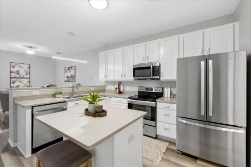 Whether preparing weeknight dinners or entertaining guests, this well-designed kitchen offers excellent workspace, storage, and a bright, welcoming feel.