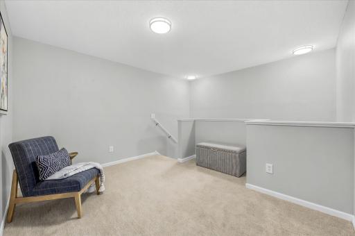 Upstairs, a versatile loft offers the perfect flex space for a home office, reading nook, workout area, or second living roomâdesigned to adapt to your needs.