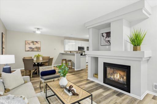 The open-concept layout flows seamlessly from living to dining, making everyday living easy and entertaining effortless.