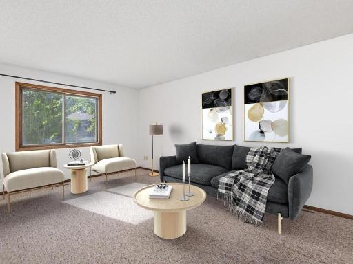 Split entry to Living room with window views and access to the deck.