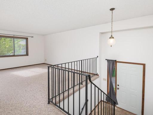 Split entry leading to unfinished lower level.