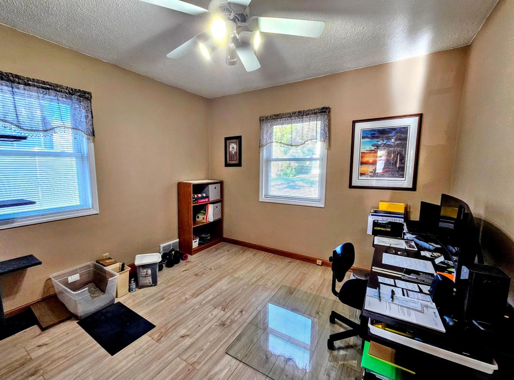 Main floor bedroom currently office space.jpg