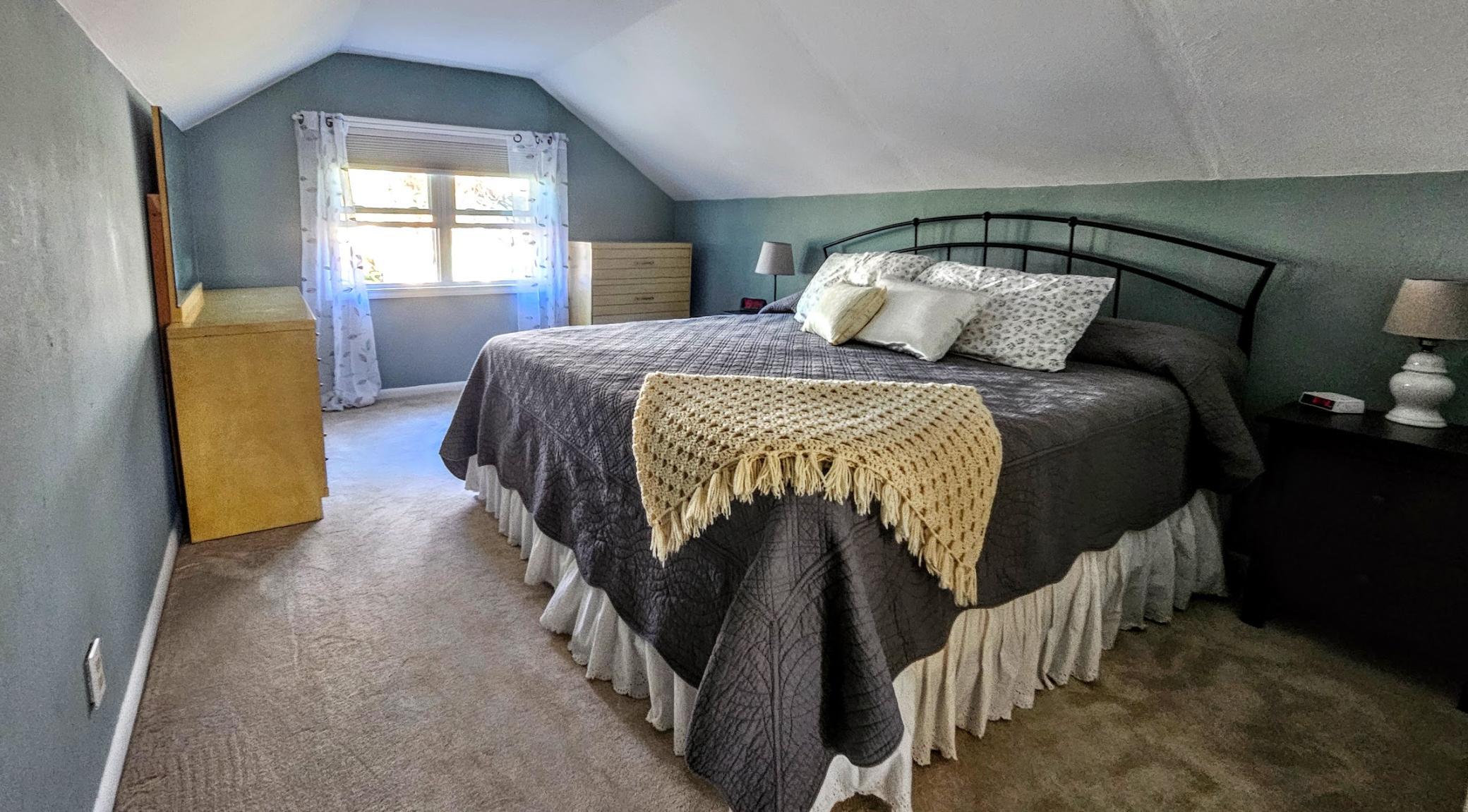 The morning sunshine pours into your upper level bedroom.jpg