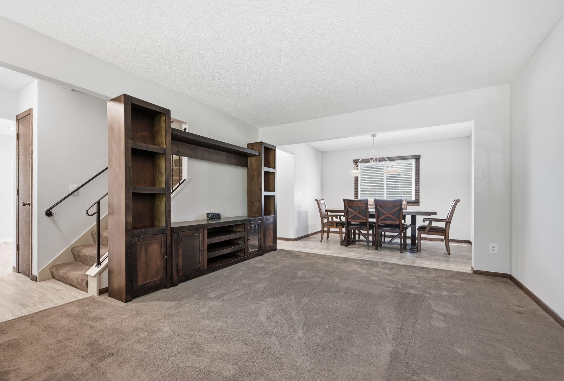 Spacious living room open to dining