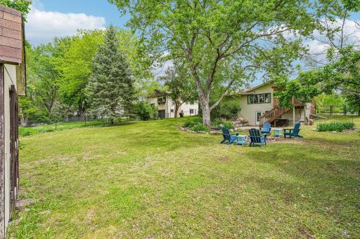 This generously sized yard provides plenty of space for outdoor activities, entertaining, or gardening!