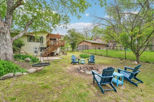 Enjoy the cozy firepit area overlooking the peaceful pond, creating the perfect setting for relaxing evenings, gathering with friends and family, or enjoying quiet nights under the stars.