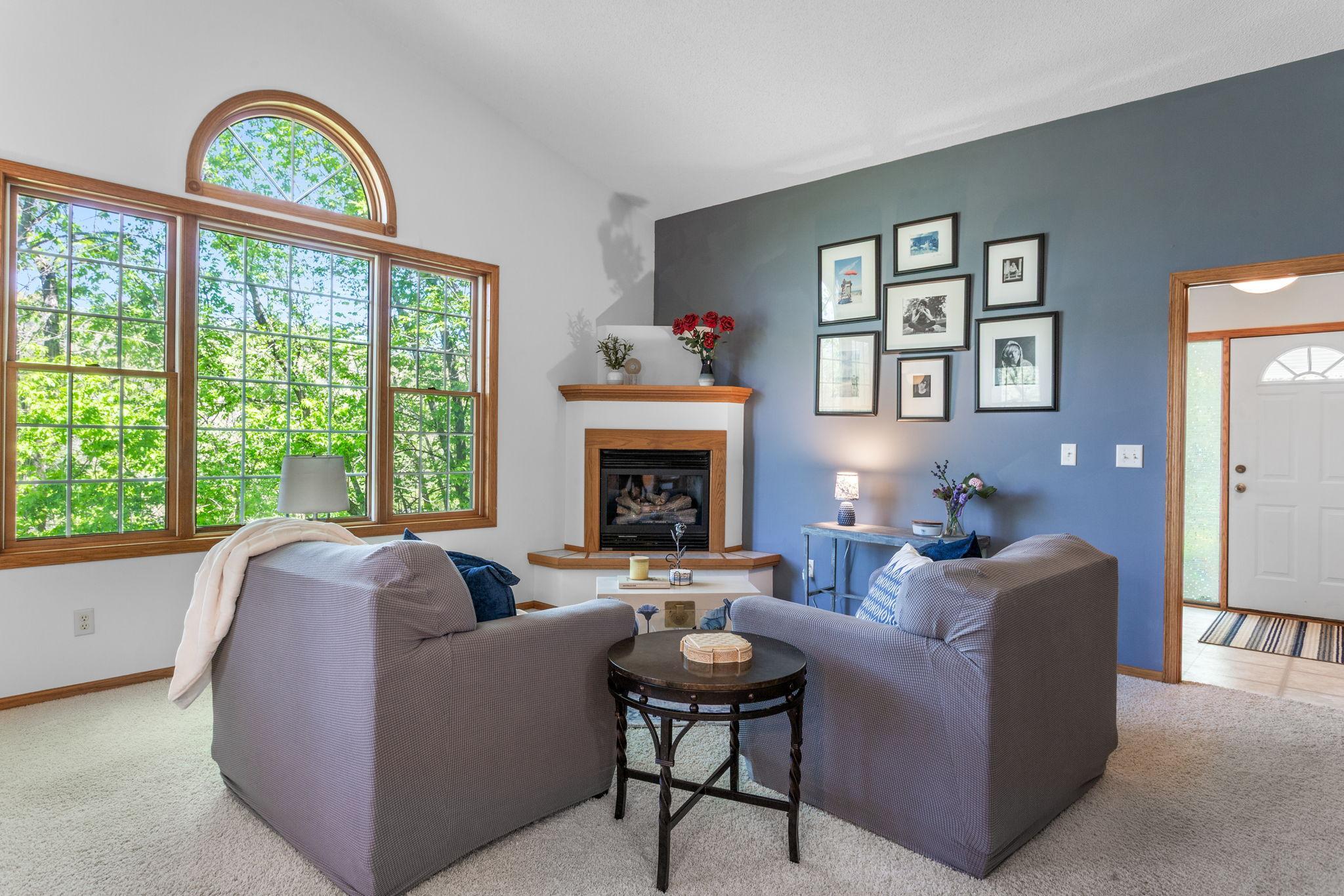 Light & Bright Living Room With Dramatic Vaulted Ceilings